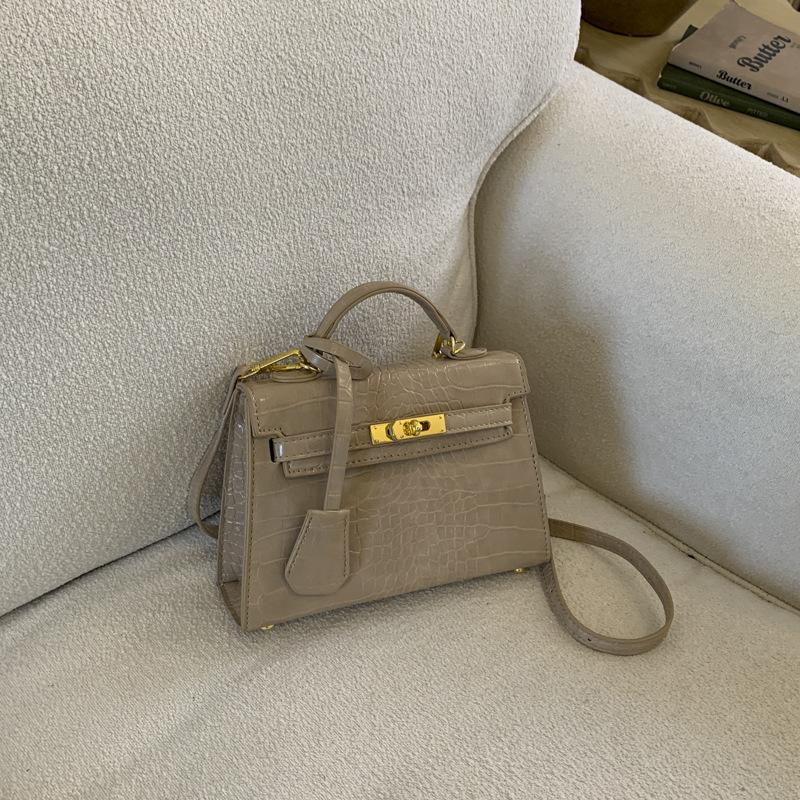 Hand-held small bag women's versatile 2025 new autumn and winter fashion texture cross-body small bag high-end shoulder bag