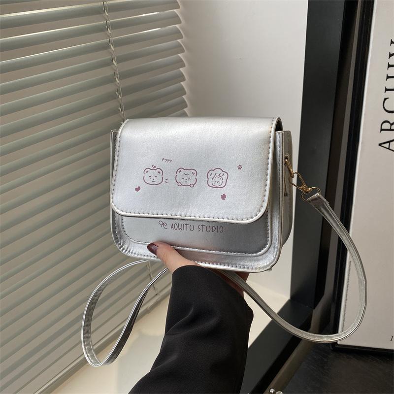 

Cute women s bag 2025 new foreign style niche fashion simple commuting texture versatile girl shoulder oblique span bag серебряный