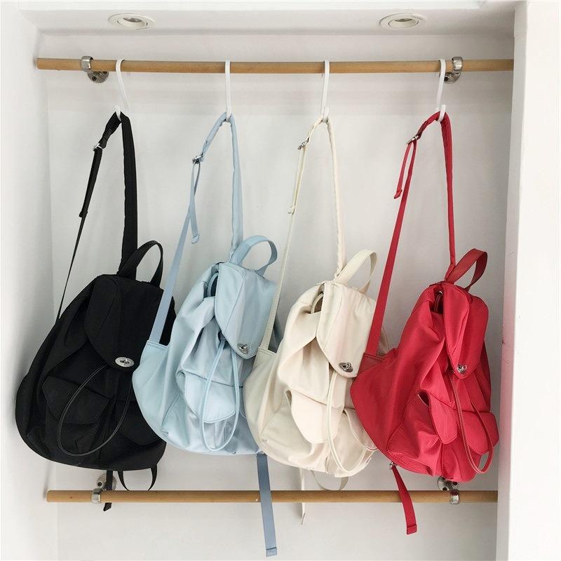 Nouveau sac à dos en nylon imperméable anti-rides pour femme, été décontracté, multi-poches, couleur unie, sac à dos de ville