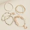 7 Pcs Stackable Starfish Pendant Bracelet Set with Mini Seed Beads - Handcrafted Beach Jewelry for Women