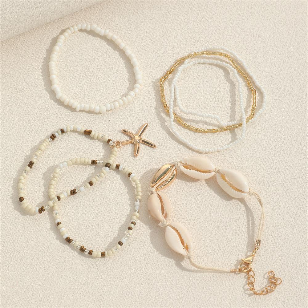 7 Pcs Stackable Starfish Pendant Bracelet Set with Mini Seed Beads - Handcrafted Beach Jewelry for Women