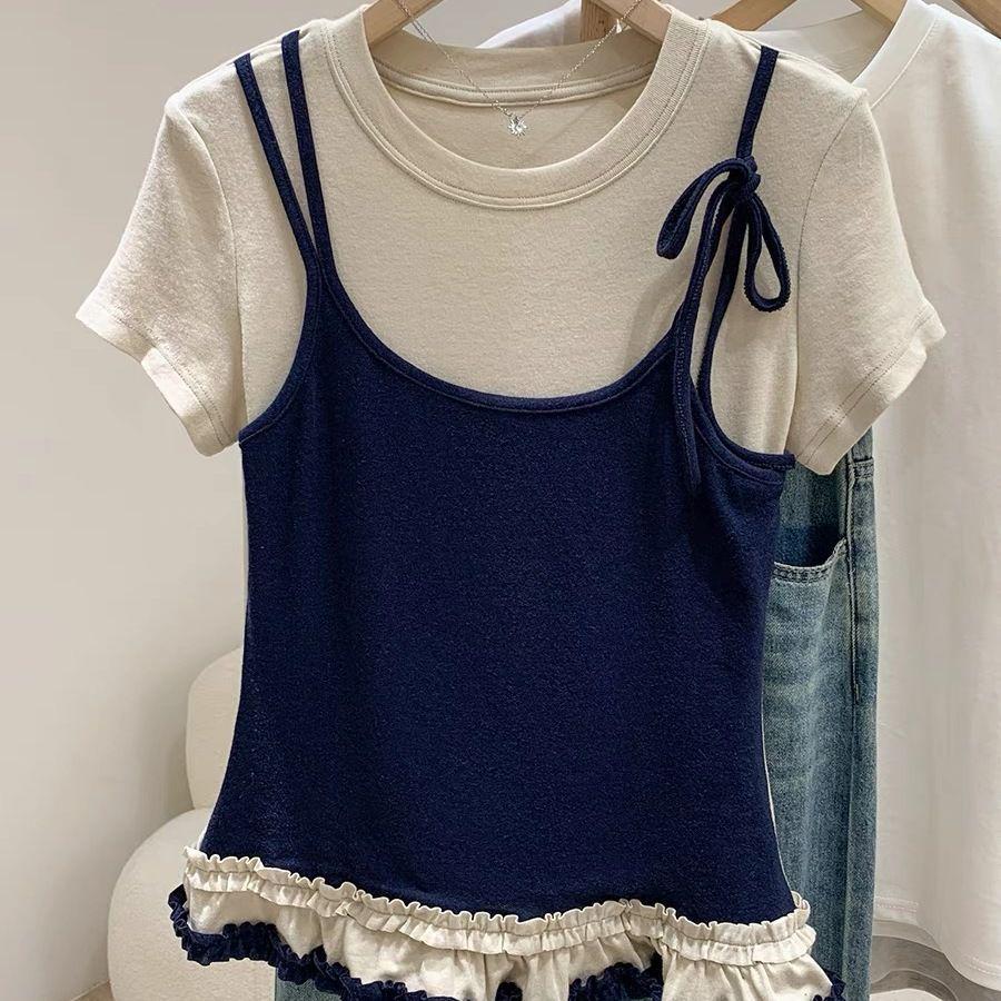 

Лето 2025 Женский приталенный топ с цветными блоками темно-синий и овсяный, с круглым вырезом, с коротким рукавом, из двух частей 2XL (65-75 kg)