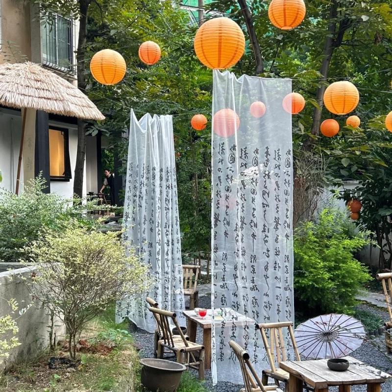 

Тканина з вуалі з каліграфією в національному стилі - Зелений весільний фон