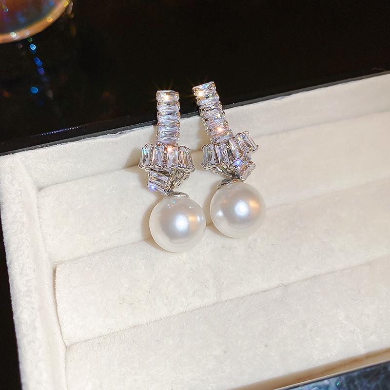 Silver needle zircon knotted pearl earrings fashion temperament light luxury stud earrings personalized simplicity high sense earrings wholesale