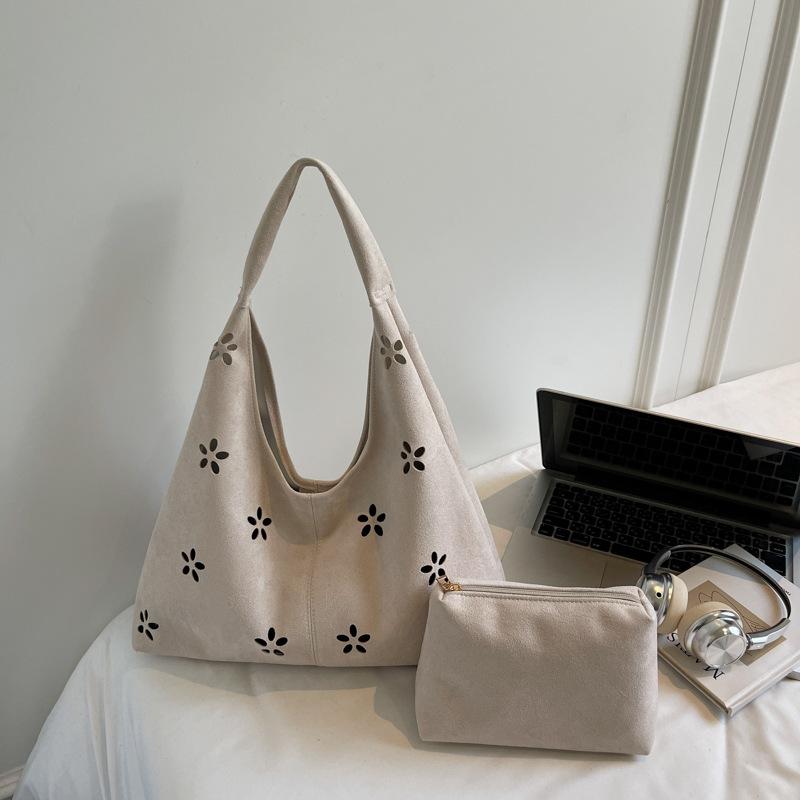 New bag women's casual hollow shoulder bag women's commute to work underarm bag literary and artistic fan tide