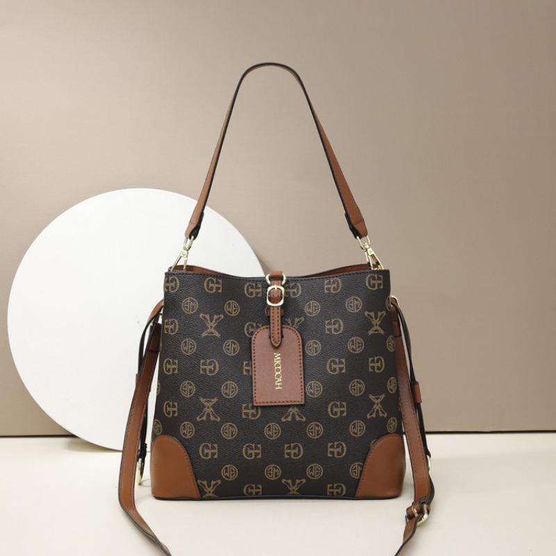 Spring and summer new women's bags, letter retro printing, portable bucket bag, high-end contrasting color tote bag, shoulder messenger bag.