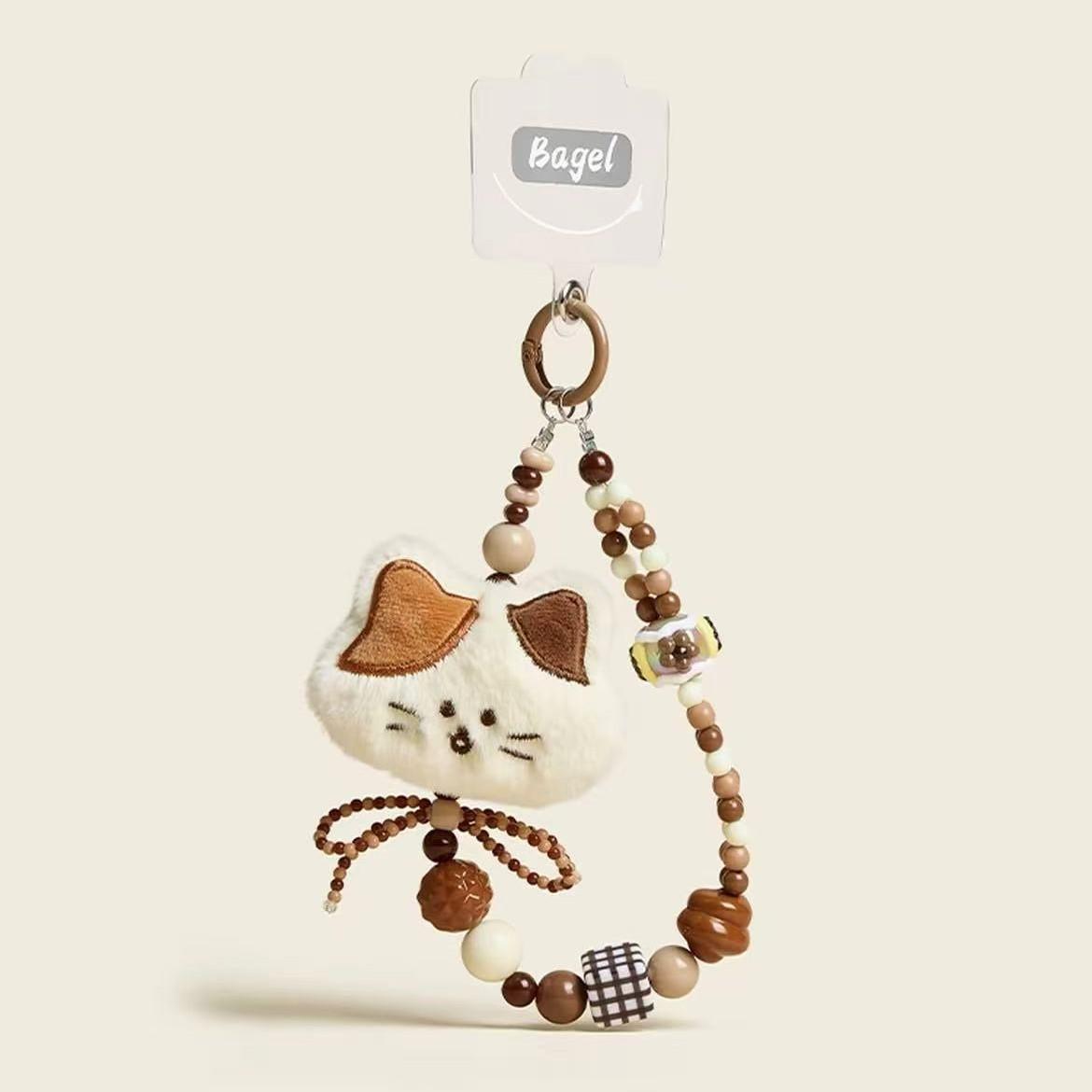 

Чарівний ведмедик телефонний шнурок: Кавовий шарм з намистин з мультяшним плюшевим кулоном 29g