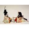wooden Hina doll display with a round face and a stylish Made by Koichimitsu Compact, case-mounted case. Cute, miniature, white, design. Jinya.