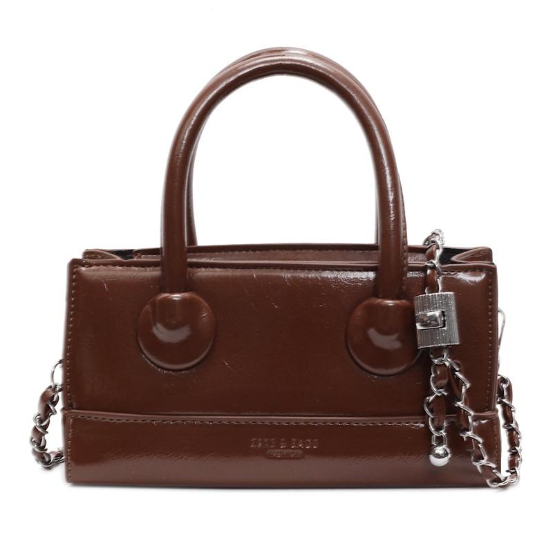 

Популярная модная изысканная портативная маленькая квадратная сумка высокого класса, универсальная сумка-мессенджер на цепочке для通勤 и отдыха, нишевая женская