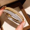 Elegante Bracciale con Fibbia a Strisce Intrecciate: Design di Lusso e Gioielli Artigianali Raffinati per Donne