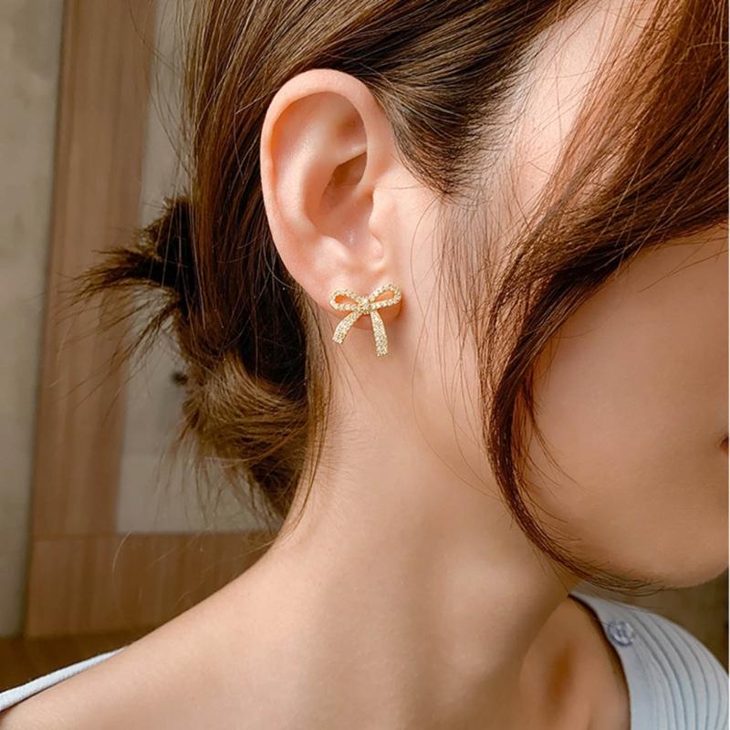 Eleganckie kolczyki sztyfty z kokardką dla kobiet dziewcząt temperament kolczyki piercing modna biżuteria proste punkowe kolczyki kolczyki sztyfty