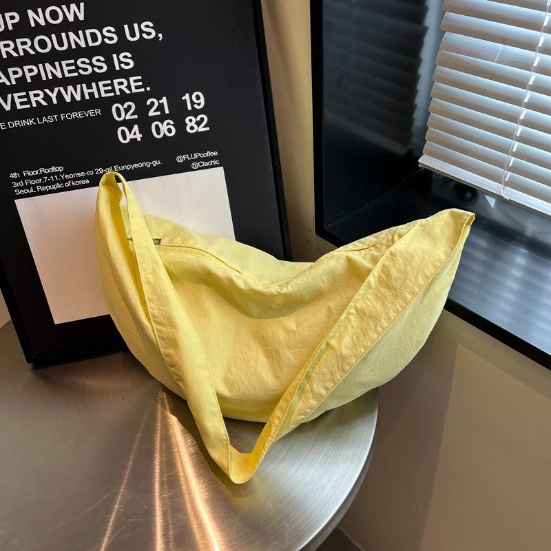 

Nylon cloth bag women s new high-end texture niche summer versatile large-capacity shoulder crossbody dumpling bag жёлтый