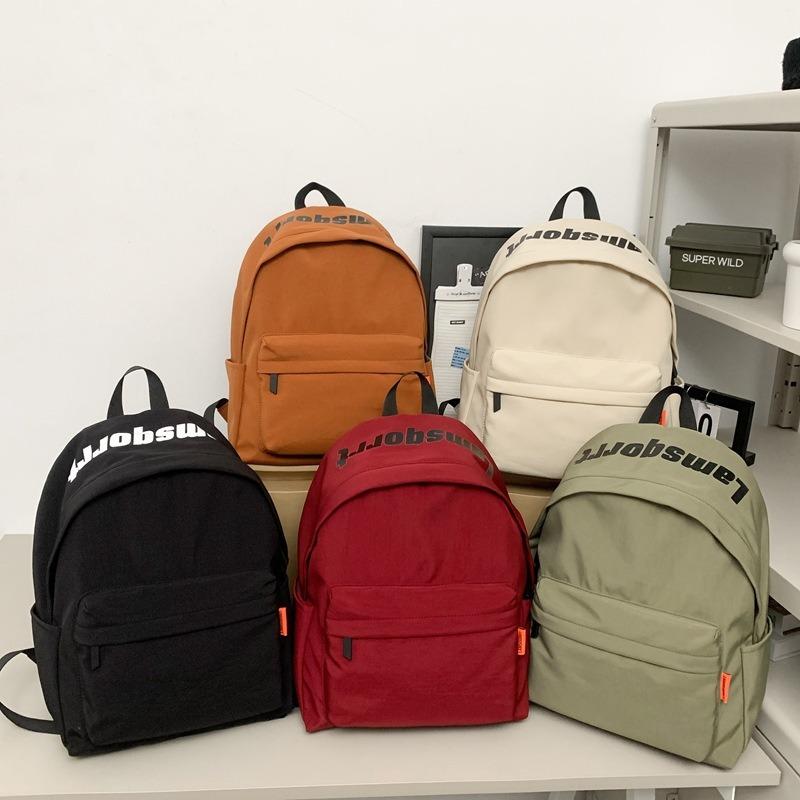 Backpack male college student fashion large-capacity schoolbag female high school student travel lightweight large-capacity computer backpack tide