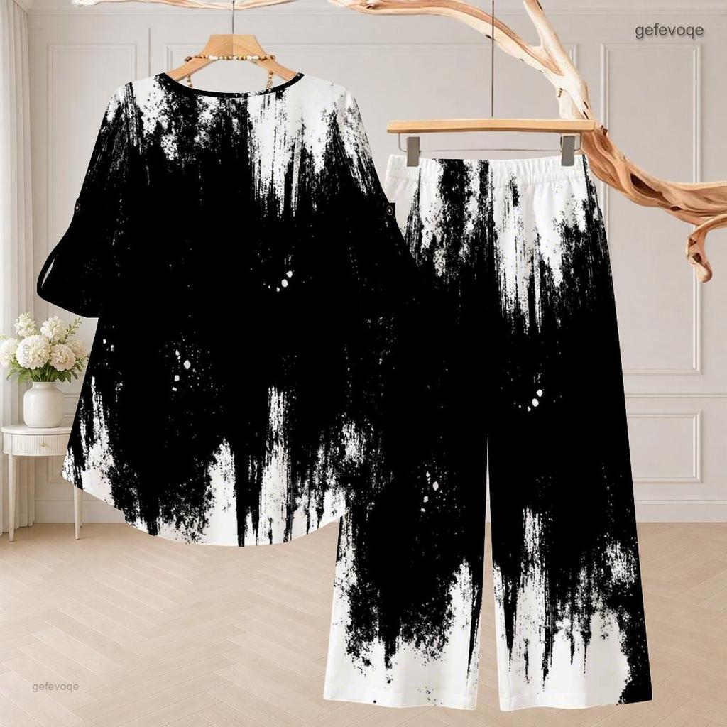 Women Plus Size Round Neck Mid Sleeve Printed Asymmetrical Top Wide Leg Pants Two Piece Set