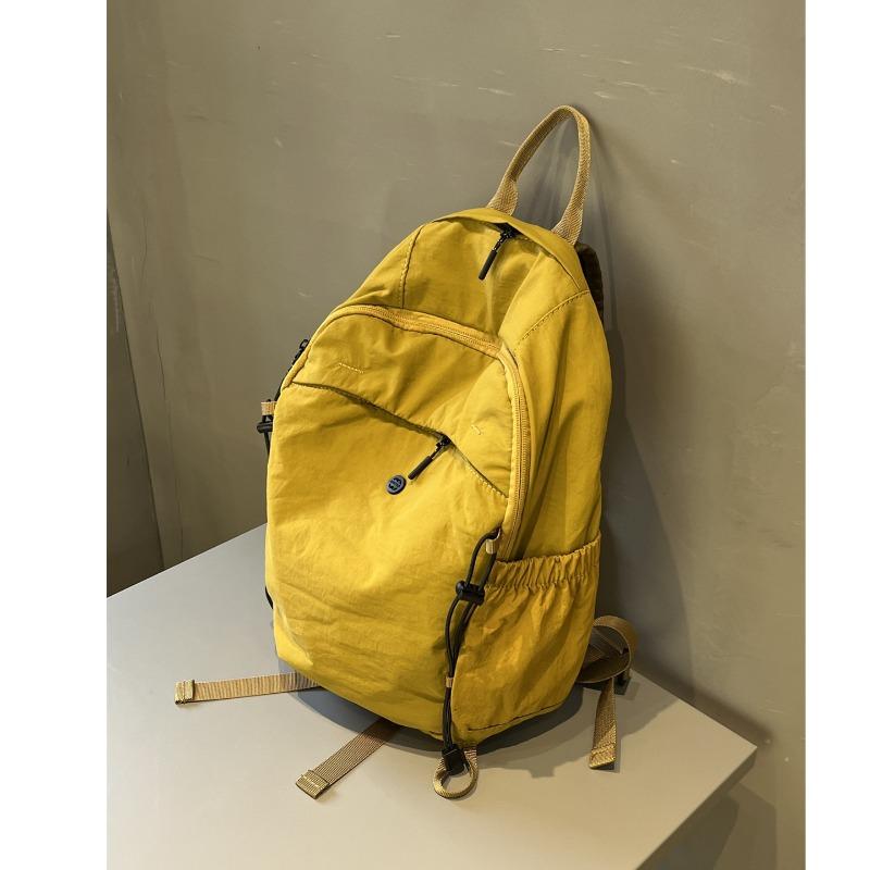 

Мужской и женский рюкзак Простая сумка для поездок на работу и путешествий большой вместимости жёлтый