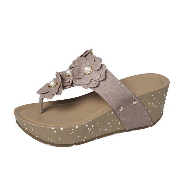 Large size slope heel slippers women's summer new engraved rivets waterproof table flip-flops women