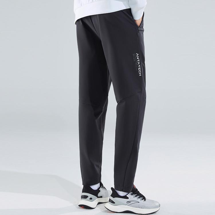 Anta Training Series Solid Color Logo Waterproof Oil Resistant Straight Leg Knitted Sports Pants Men Pants Black 952317501-2