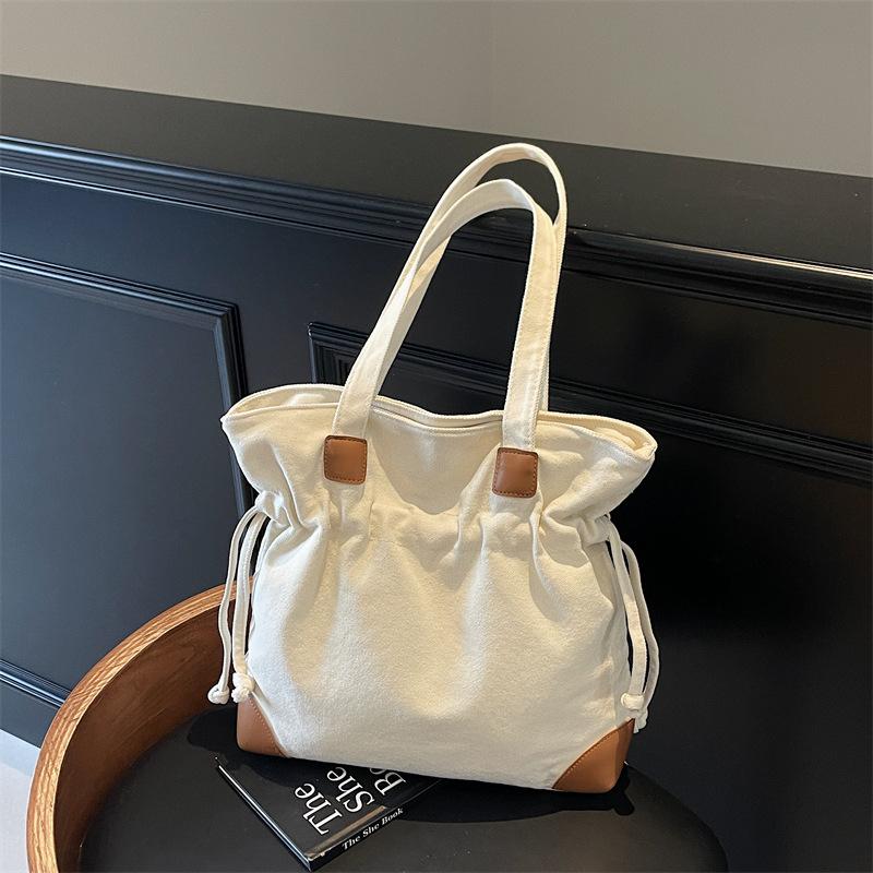 Casual Lazy Wind Simple Capacity Canvas Bag Women 2025 New Simple Korean Version Versatile Shoulder Bucket Bag