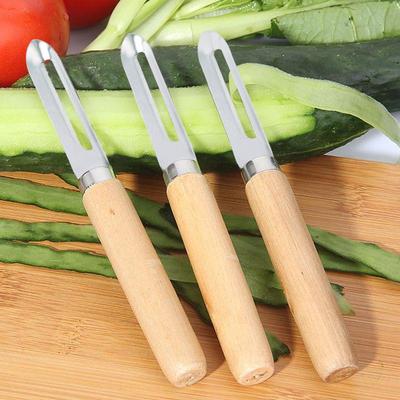 Stainless Steel Peeler with Wooden Handle for Apples, Potatoes, Fruits, Melons, and Radishes.