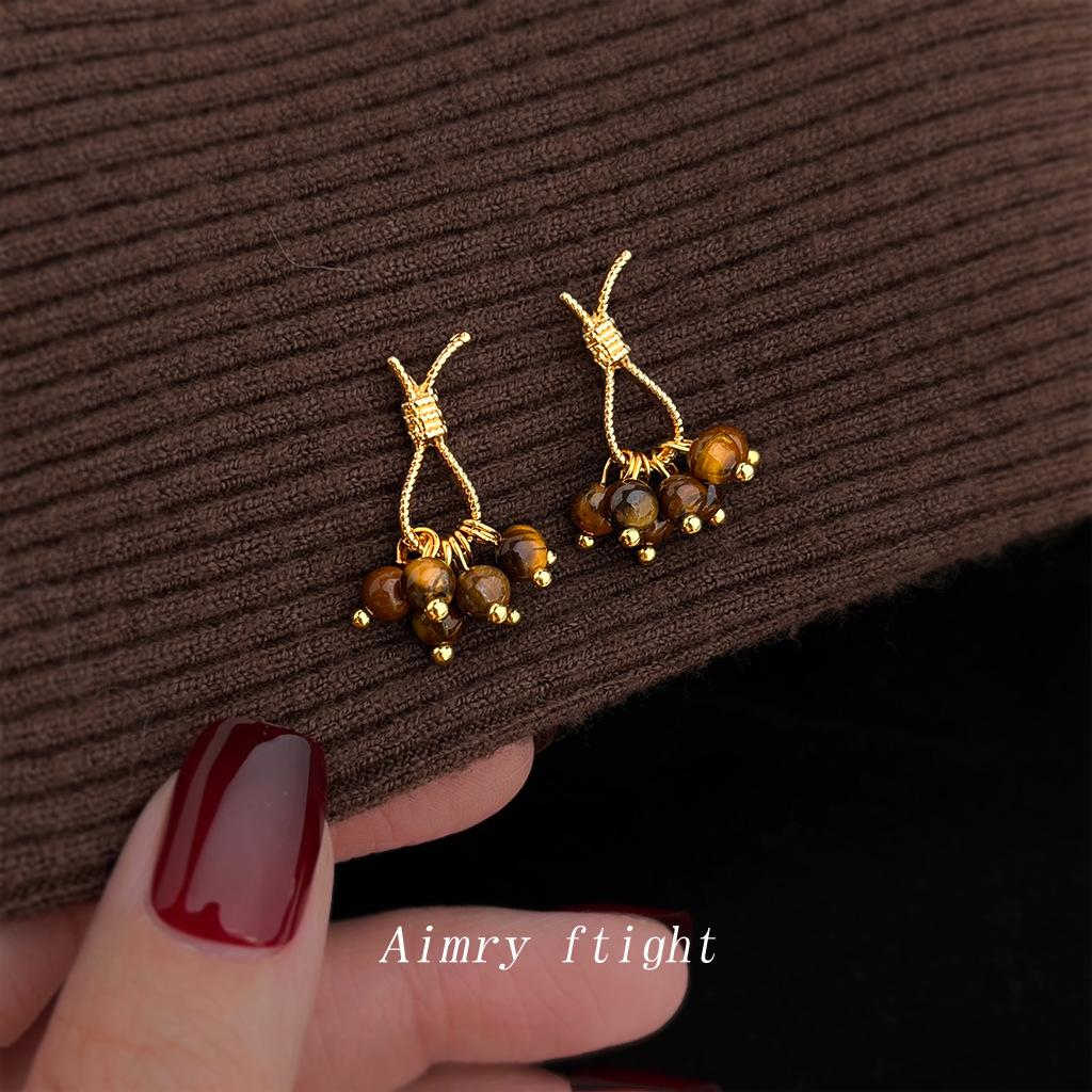 

Maillard style literary natural stone tiger s eye stone rope knot creative Japanese and Korean earrings earrings