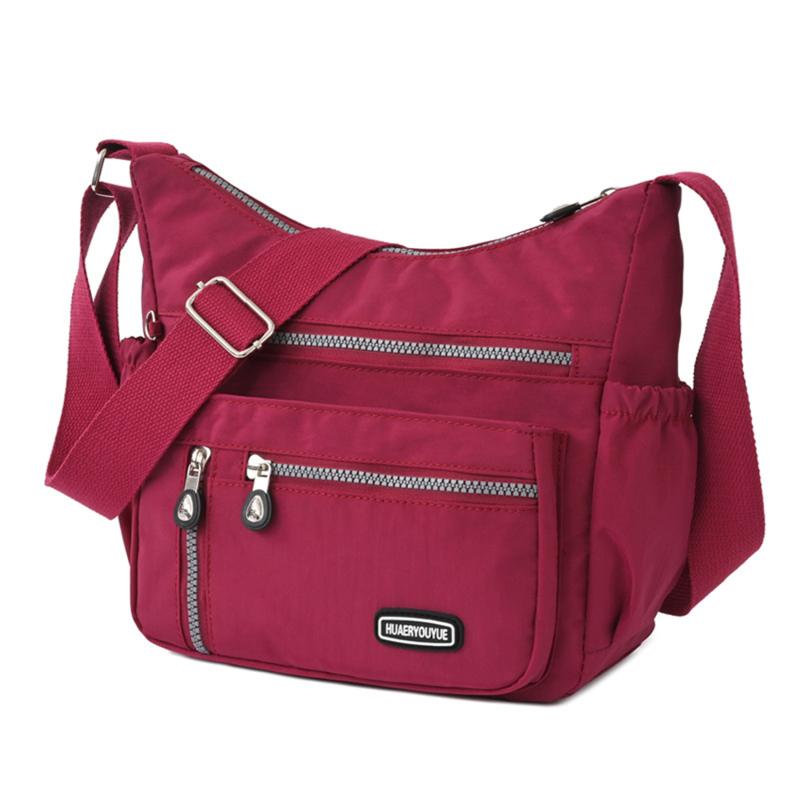 Moda casual náilon pano saco do mensageiro para as mulheres sacos de ombro multi camada feminina crossbody sacos à prova dwaterproof água mãe bolsa