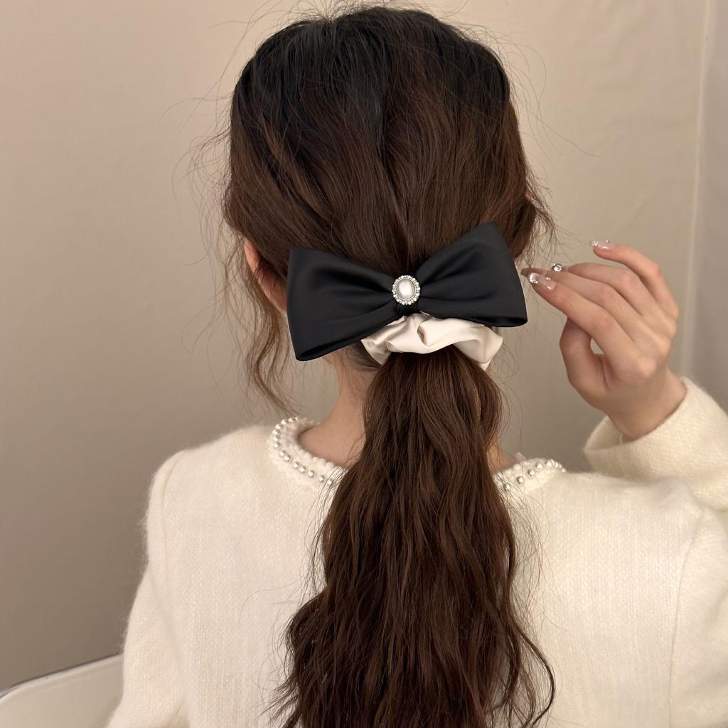 A Tall and Elegant Bow Tie, Hair Band, Headwear, High Elastic Hair Tie, and A Hair Tie At The Back of The Head
