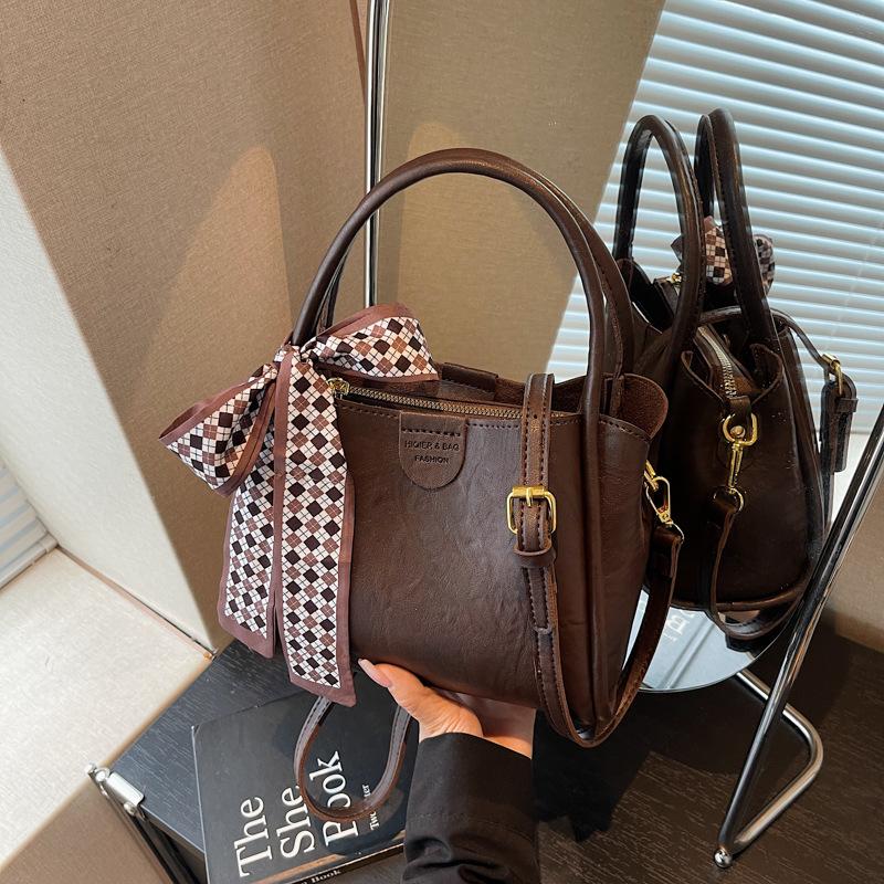 

Retro hand bucket bag women s new trendy fashion versatile shoulder bag premium texture messenger bag темно-коричневого