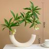 Lifelike Artificial Flower Arrangement - Potted Green Plants for Indoor Decoration in Living or Dining Rooms.