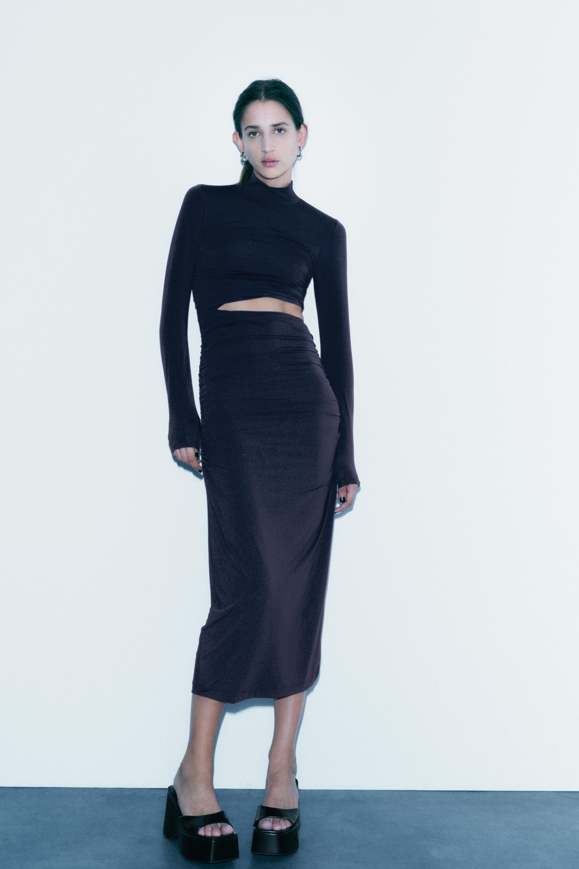 

FITTED DRESS WITH CUT-OUT DETAIL