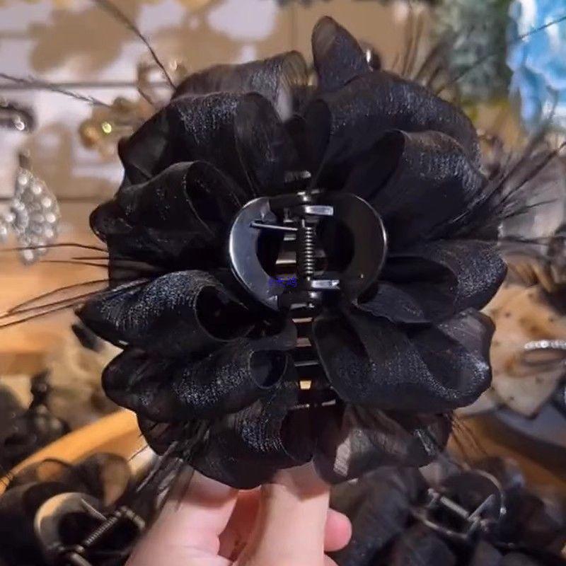 

Elegant Feather Claw Hair Clip: Large, Fluffy, Light Luxury Hairpin for Top or Back of Head.