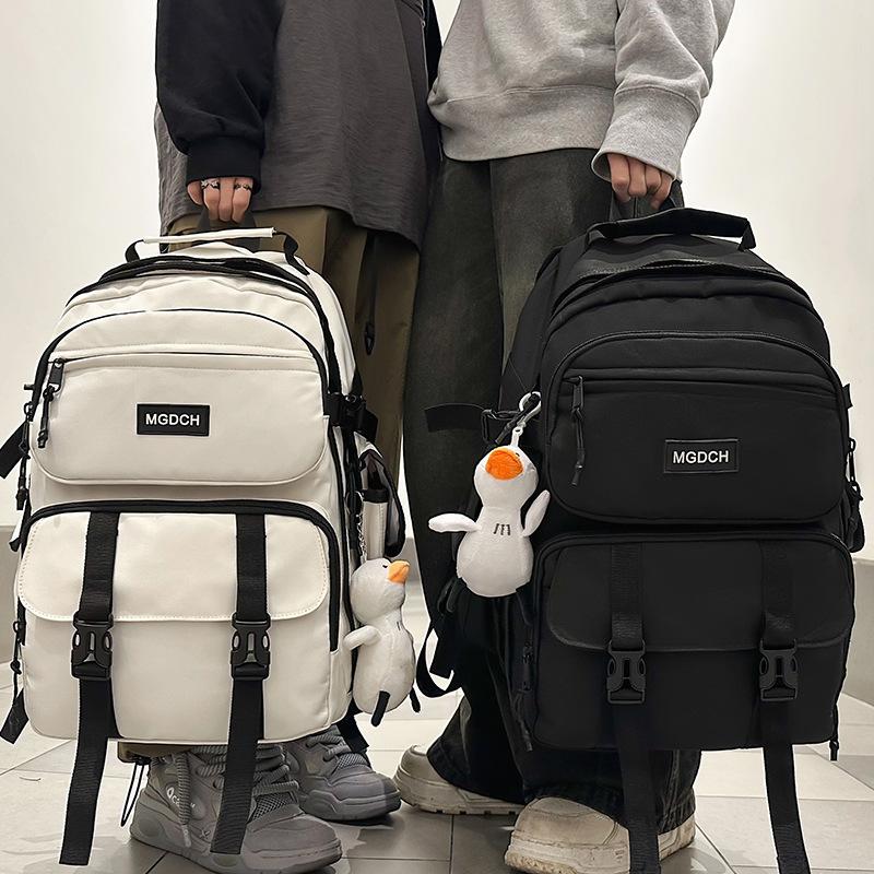 High School Students with Large Capacity and Multiple Backpacks Junior High School Students with Primary School Students with Backpacks