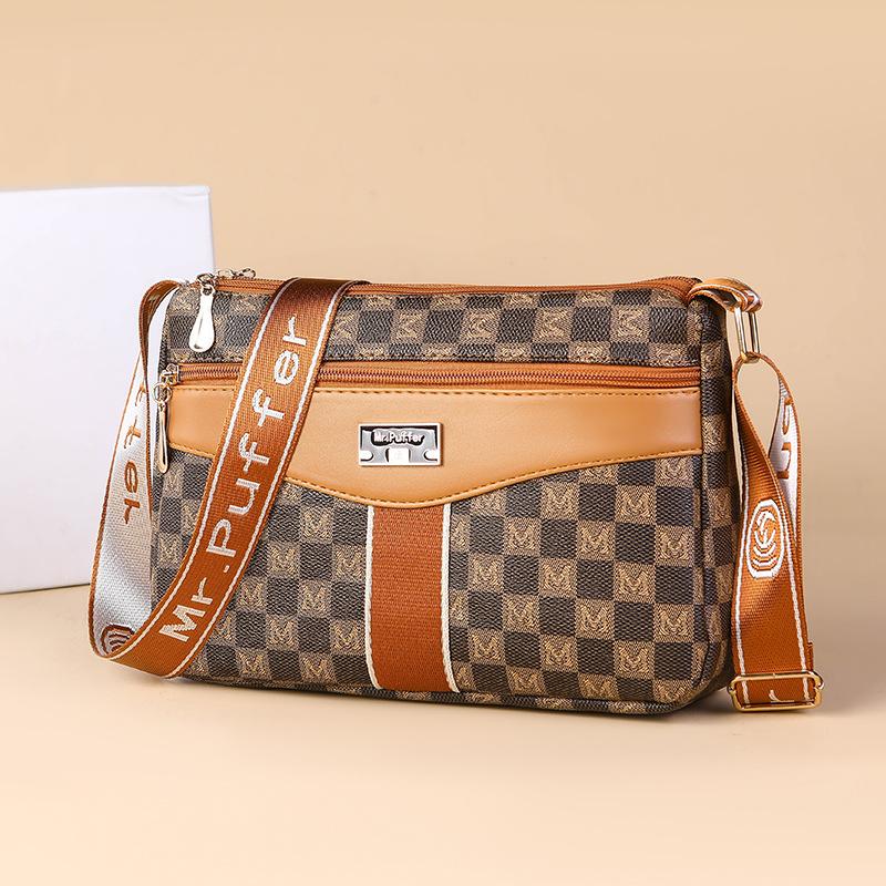 Middle-aged and Elderly Mother Buying A Large-capacity Multi-functional Shoulder Crossbody Bag In Spring