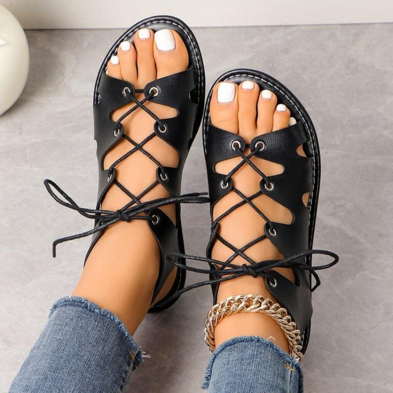 Flat open-toed crossed thin strap cool slippers women's new fringed shoes hollow women's sandals