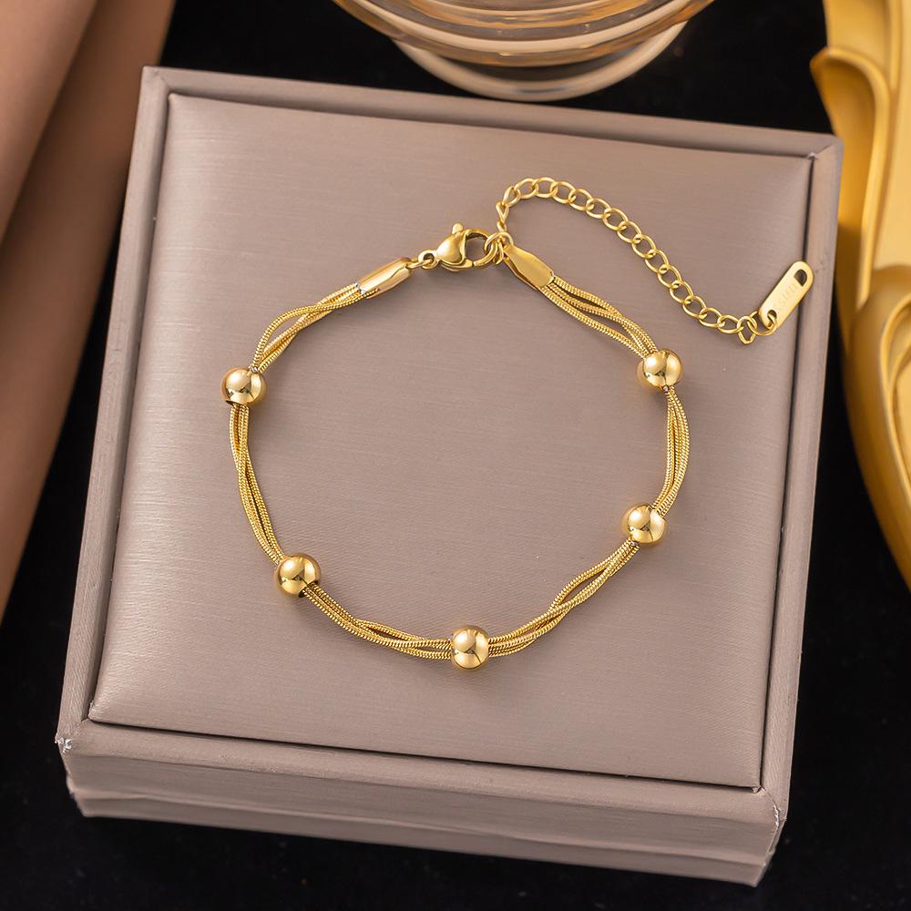 Preferred Bracelet 2: Qi Yun Fashionable Stainless Steel Cross Bracelet - Trendy, Statement, Light Luxury Jewelry.