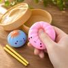 Stress Relief Toy Set Includes Two Soft Squeeze Dumpling Toys with Bamboo Steamer Container and Chopsticks for Sensory Play and Anxiety Reduction