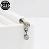 G23 Titanium Cartilage Stud with Zircon Chain and Lightning-Inlaid Titanium Lip Stud.