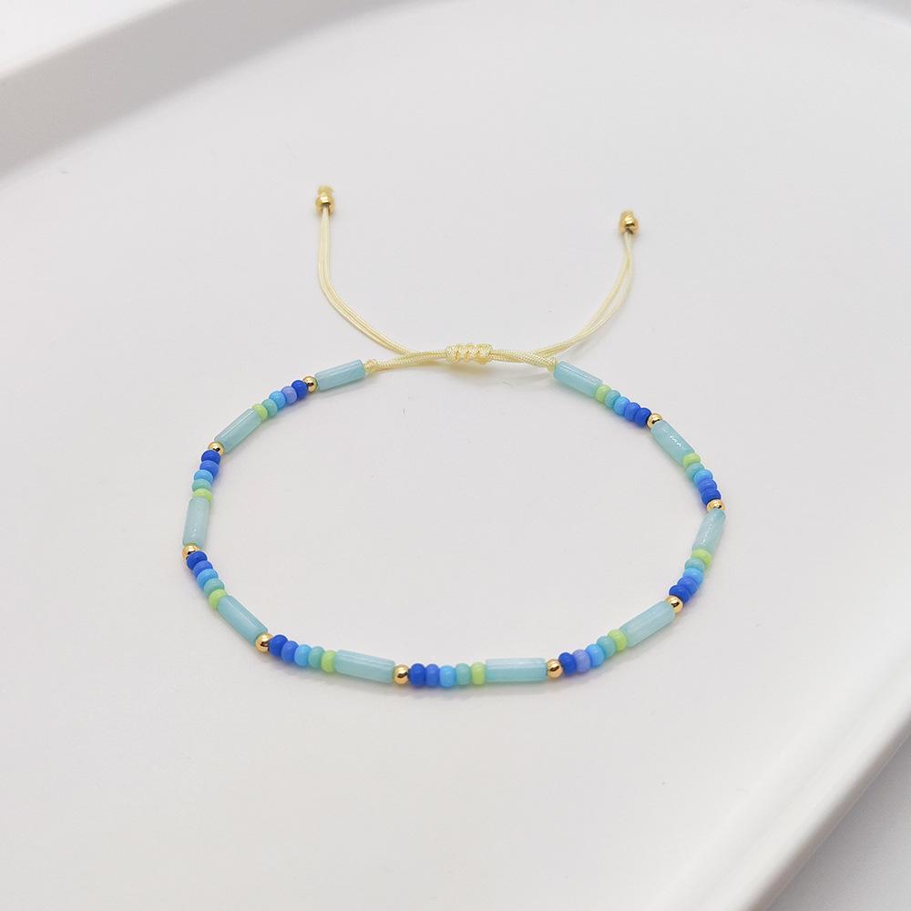 Originales Naturmuschel Zylinderperlen Armband: Fein gewebtes Glücks-Handseil für Frauen