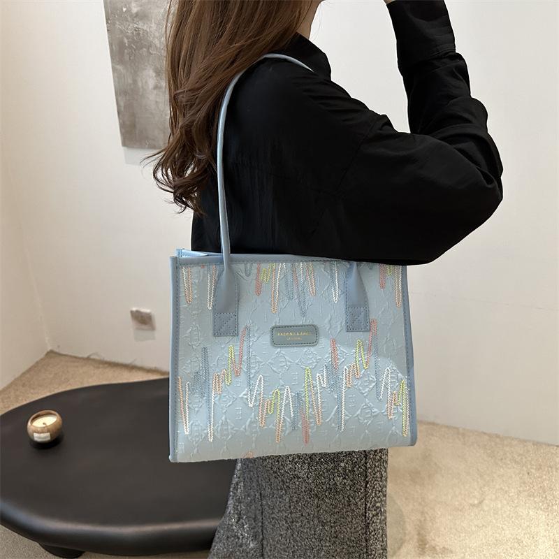 Stylish portable shoulder bag, commuting beautiful large-capacity canvas bag, simple 2025 new women's bag, foreign style tote bag