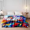 A vibrant abstract figure dancing with fluid motion in bold colors. for all seasons blanket lunch break throw gift