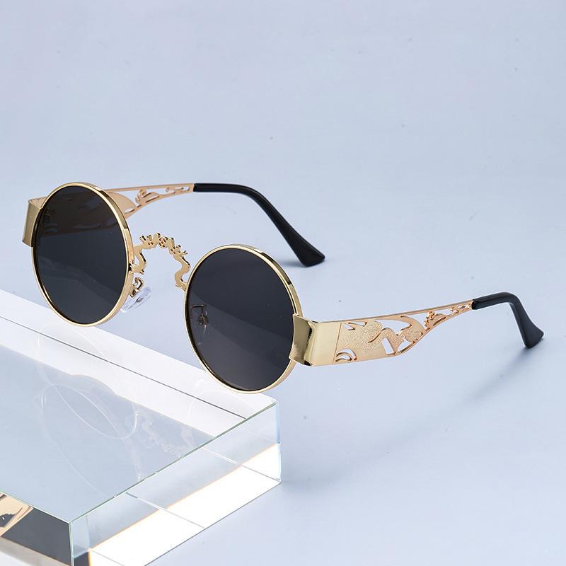 New hollow metal punk sunglasses dragon and phoenix glasses legs glasses retro round personalized sunglasses European and American trend street shoot