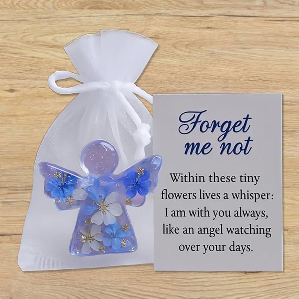Sympathy Forget Me Not Angel present with intricate flower accents created to offer peace and remembrance in times of sorrow
