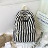 High-value college style striped backpack for junior high school students, casual, simple, lightweight and large-capacity backpack.