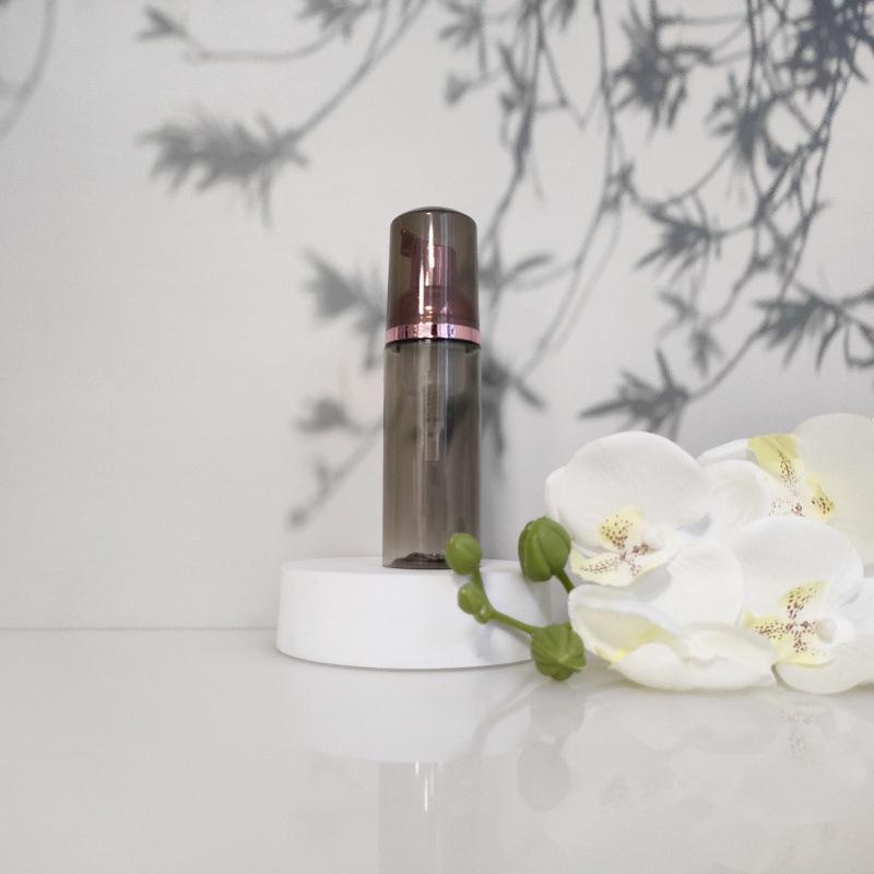 Available 60ml Transparent Black Foam Mousse Bottle for Face Wash and Travel-friendly Cosmetic Packaging.