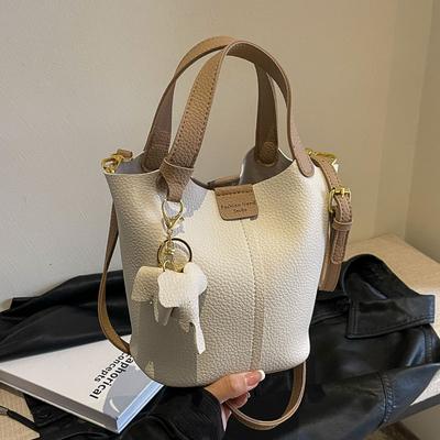 Damen PU-Leder Eimer Tasche Modisch Französisch Nische Designer Große Kapazität Vielseitig Pendler Crossbody Tasche Reise Tragetasche