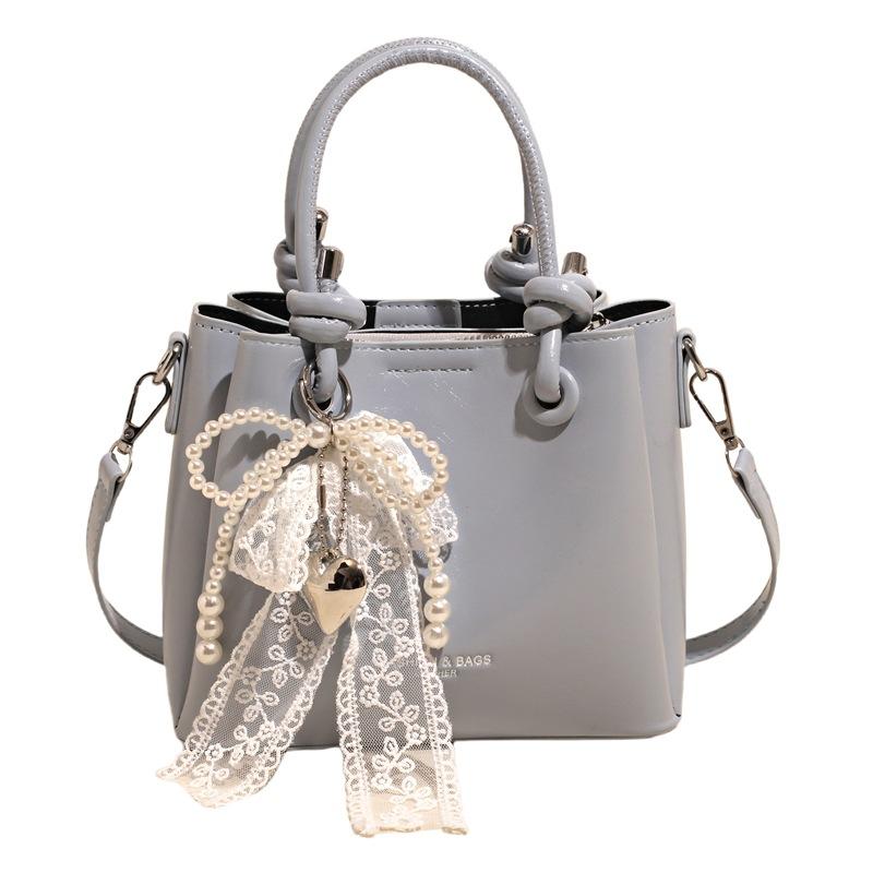 This year's new product is fashionable, simple, personalized and versatile, portable bucket bag, women's daily commuting and leisure, high-end messeng