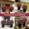 large and realistic artificial Boston ferns and dragon blood trees, artificial cordyceps plants, vibrant pink purple leaves