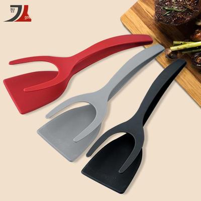 Twee-in-één Nylon Keukenspatel en Voedselklem voor Steaks, Toast en Omeletten