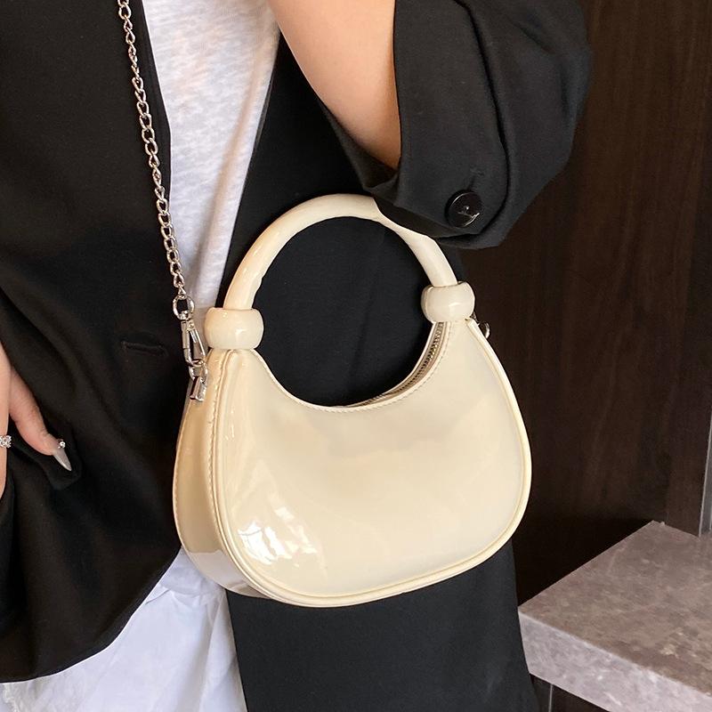 Trend wholesale fashion simple personality patent leather portable dumpling bag casual versatile commuter chain messenger bag women