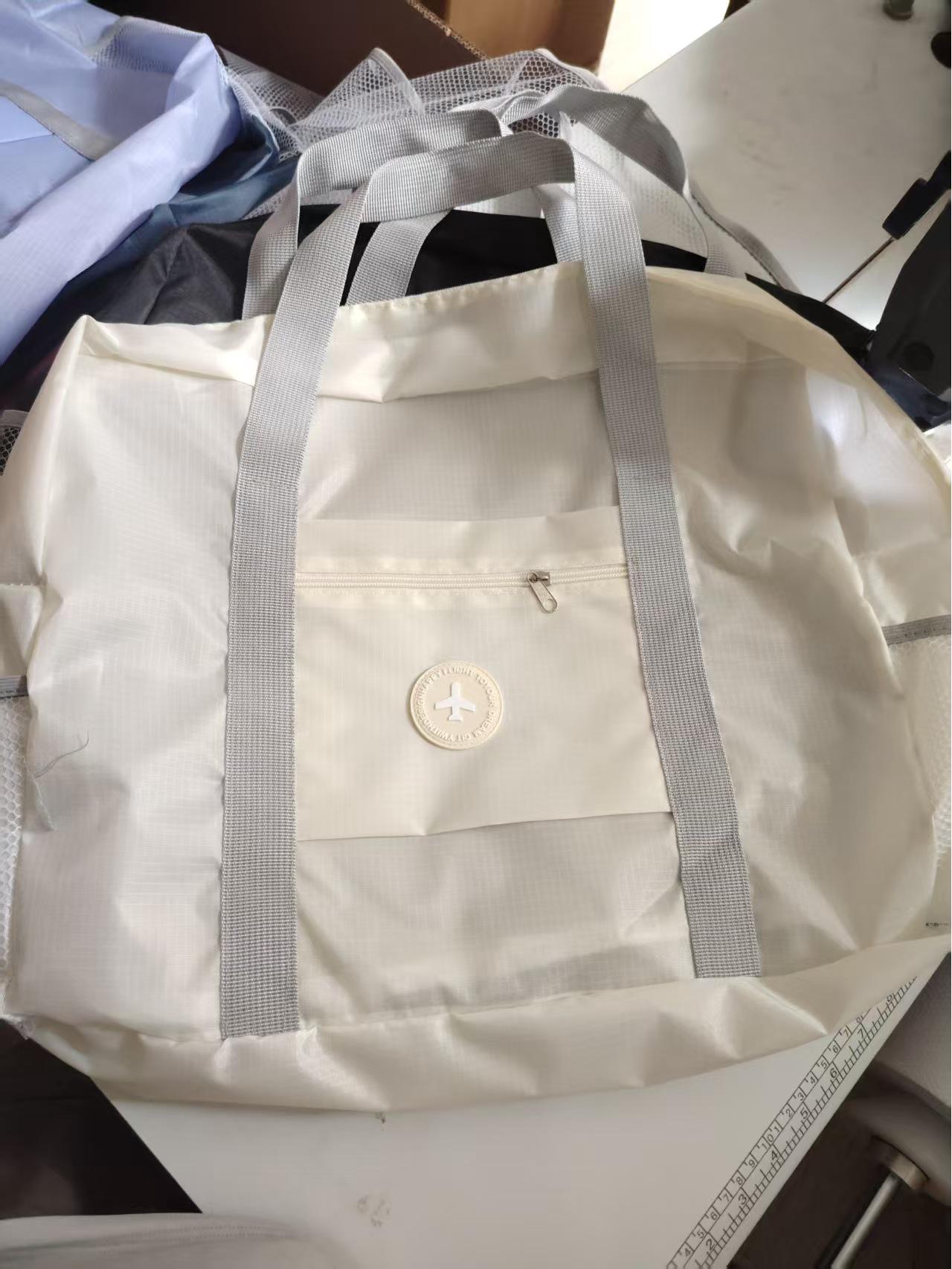 

Large Foldable Double-Layer Travel Bag: Spacious Handbag for Airplane, Sports, Moving, Maternity, or Business Trips.