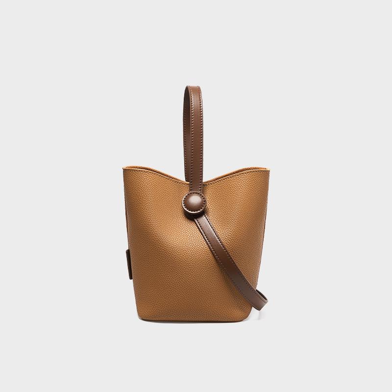 Dieses Jahr sind trendige Taschen, Gemüsekorb-Taschen, Eimer-Taschen, hochwertige Damen-Umhängetaschen und modische Handtaschen im Trend.